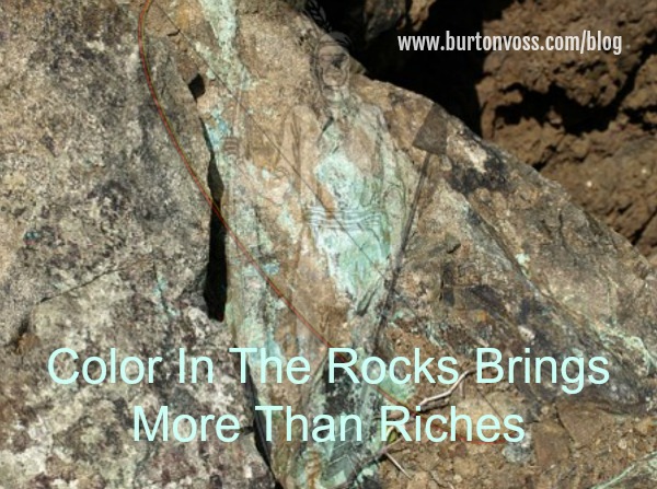 Image of Apache seen in copper-stained rock.