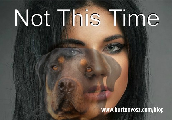 Close-up of a girl's face with a slightly offset, faded picture of a Rottweiler superimposed.